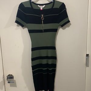 Green and black “sweater” dress. Size small. Gold front zipper. Never worn